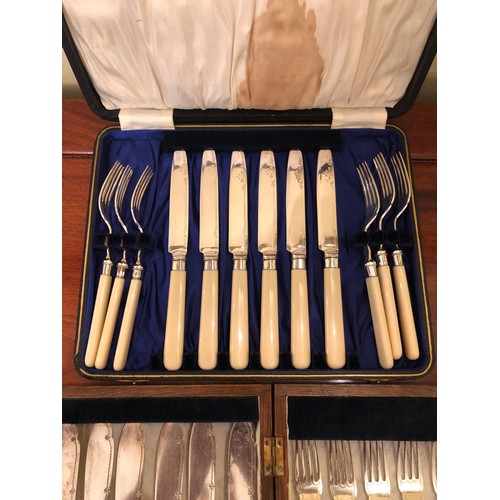 718 - 2 sets of fish knives