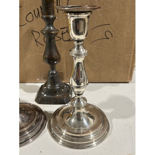 779 - Pair of Viners silver plated candlesticks plus another single