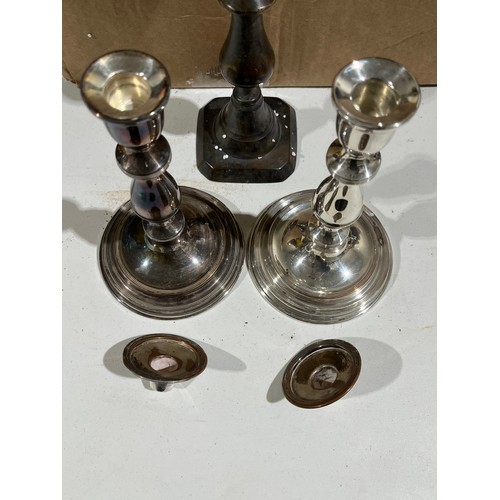 779 - Pair of Viners silver plated candlesticks plus another single