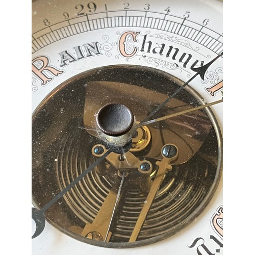 785 - Old wood cased wall hanging Barometer with open window to view workings, set in a carved plaque. num... 