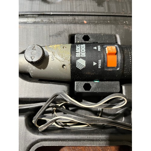 879 - Black and Decker electric screwdriver.