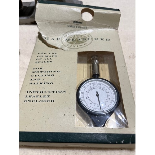 935 - Map measure stamp and thermometer set in onyx