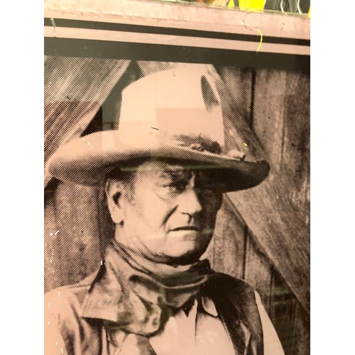 944 - John Wayne image reverse printed on glass.