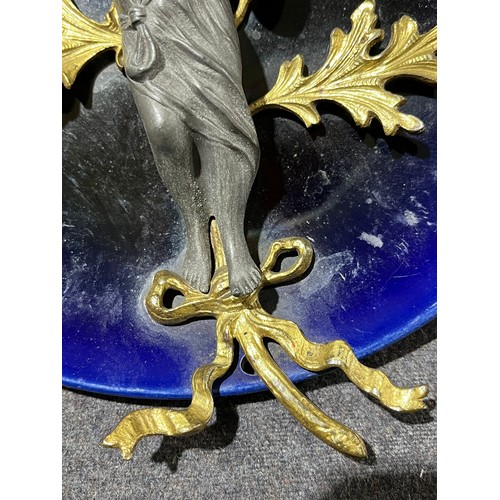 1030 - French cobalt blue wall plate with pewter figurine attached.