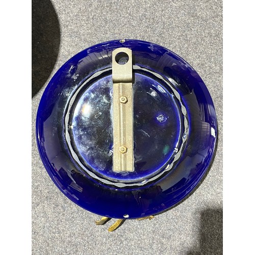 1030 - French cobalt blue wall plate with pewter figurine attached.