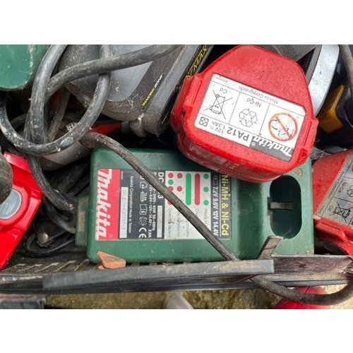 1035 - Crate of drills with lots of batteries and a hedge trimmer.