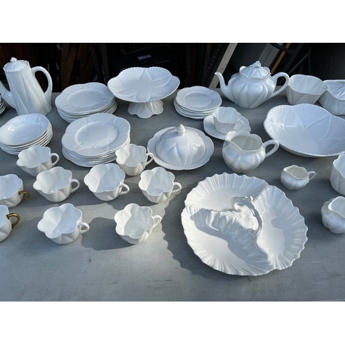 1047 - Large collection of Shelley and Wileman & co Dainty white patterned dinner and teaware.