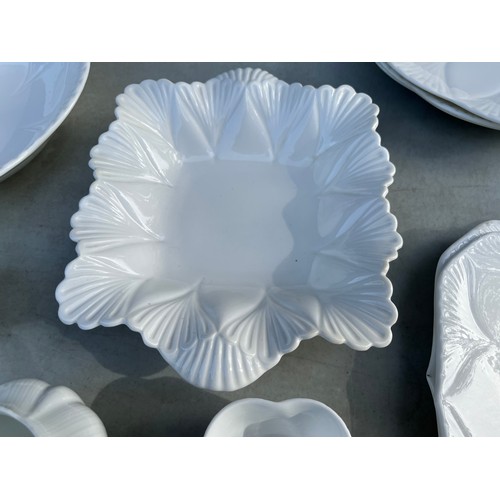 1047 - Large collection of Shelley and Wileman & co Dainty white patterned dinner and teaware.