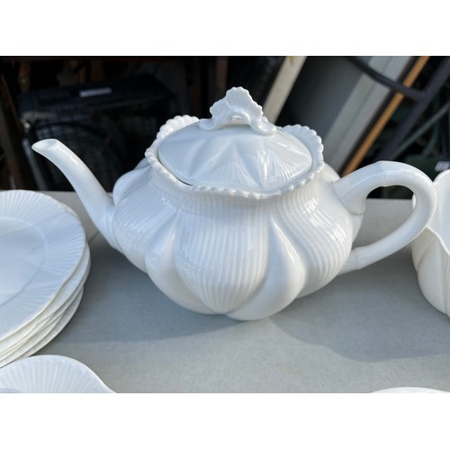 1047 - Large collection of Shelley and Wileman & co Dainty white patterned dinner and teaware.