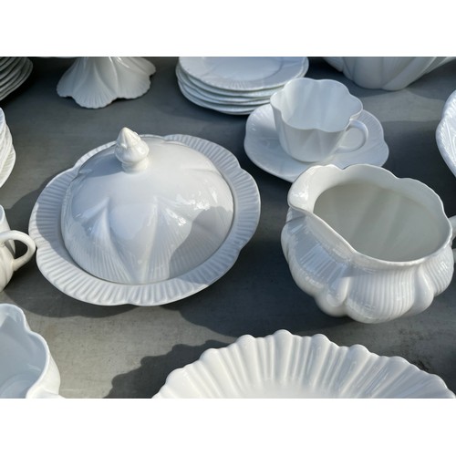 1047 - Large collection of Shelley and Wileman & co Dainty white patterned dinner and teaware.