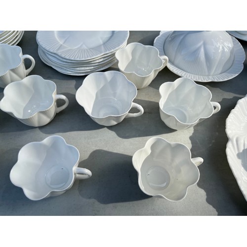 1047 - Large collection of Shelley and Wileman & co Dainty white patterned dinner and teaware.