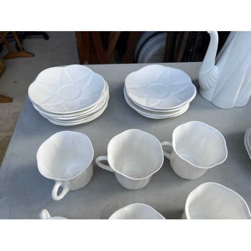 1047 - Large collection of Shelley and Wileman & co Dainty white patterned dinner and teaware.