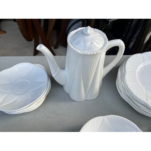 1047 - Large collection of Shelley and Wileman & co Dainty white patterned dinner and teaware.