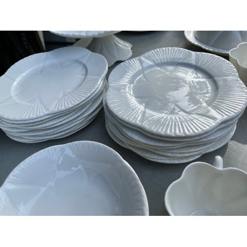 1047 - Large collection of Shelley and Wileman & co Dainty white patterned dinner and teaware.