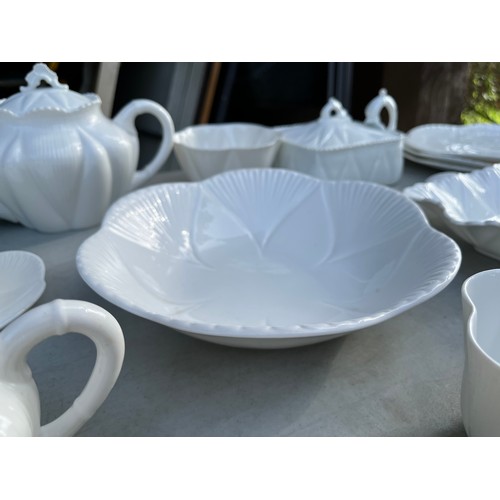 1047 - Large collection of Shelley and Wileman & co Dainty white patterned dinner and teaware.