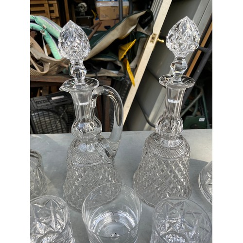 1049 - Tudor Crystal carafe and decanter along with Edinburgh and other decanters with a mix of glasses inc... 