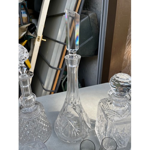 1049 - Tudor Crystal carafe and decanter along with Edinburgh and other decanters with a mix of glasses inc... 