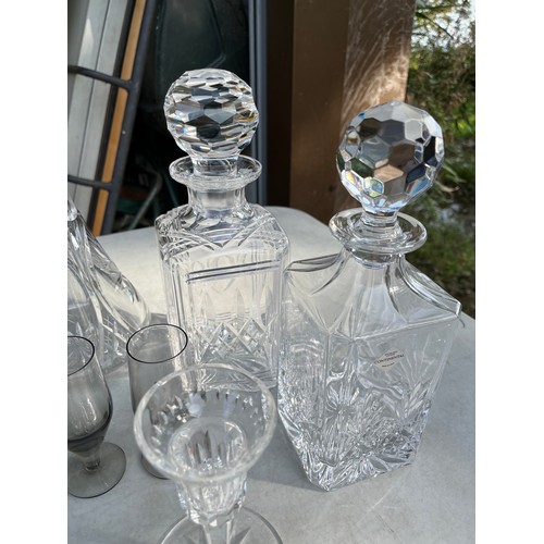 1049 - Tudor Crystal carafe and decanter along with Edinburgh and other decanters with a mix of glasses inc... 