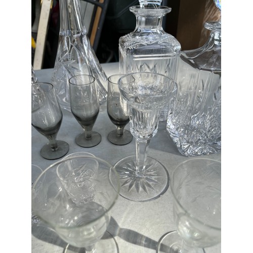 1049 - Tudor Crystal carafe and decanter along with Edinburgh and other decanters with a mix of glasses inc... 