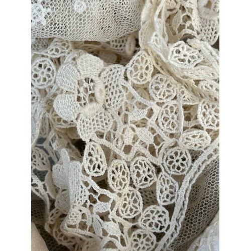 1072 - Antique Victorian Textiles - Rolls of lace edging etc in a satin soft bag