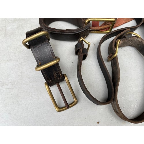 1098 - Horse leathers including cropper and driving harness parts.