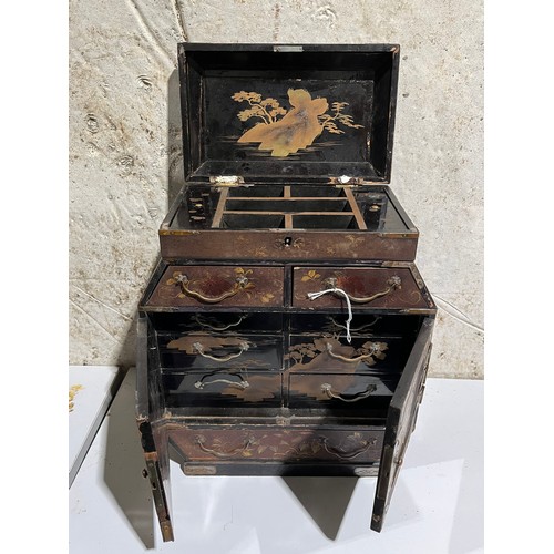 1126 - Chinese jewellery cabinet bound with brass and hand painted with gold