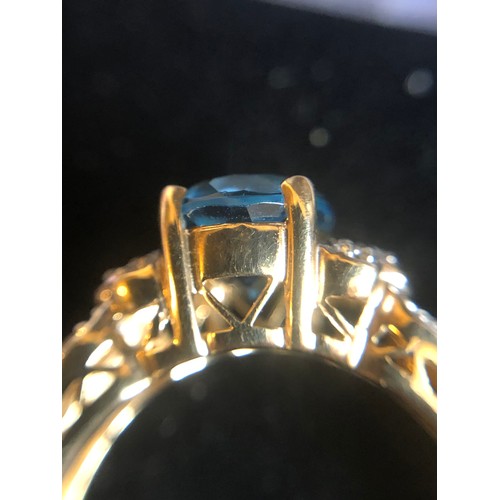 1137 - 9ct gold ring with Topaz and Diamond gallery setting. Size O 1/2