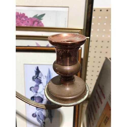 47 - Brass and copper candlestick. Silver plate worn away