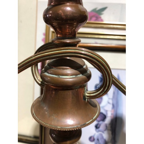 47 - Brass and copper candlestick. Silver plate worn away