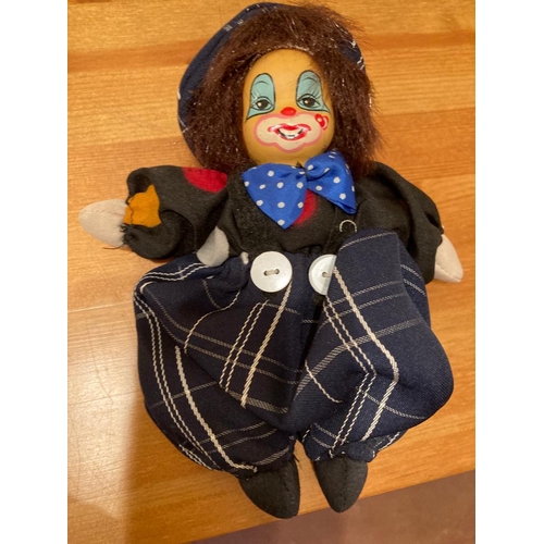 126 - Small china clown doll