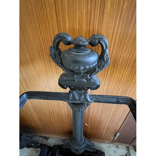 135 - Antique heavy cast iron stick stand and umbrella stand with tray.