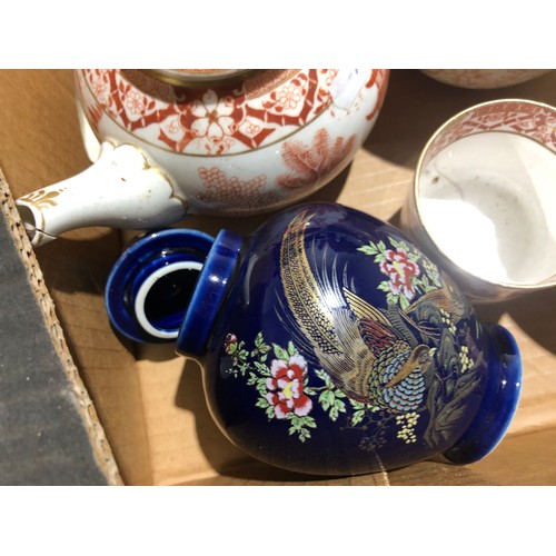 151 - Fruit box containing Royal Worcester. Shelley. Herend. Coalport.