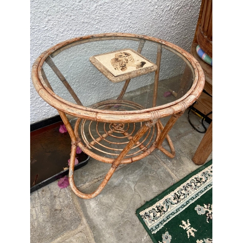 572 - Glass topped table.