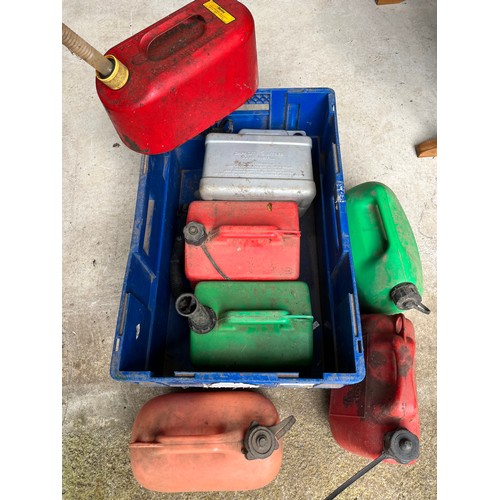 657 - Box of petrol cans including an interesting metal can.