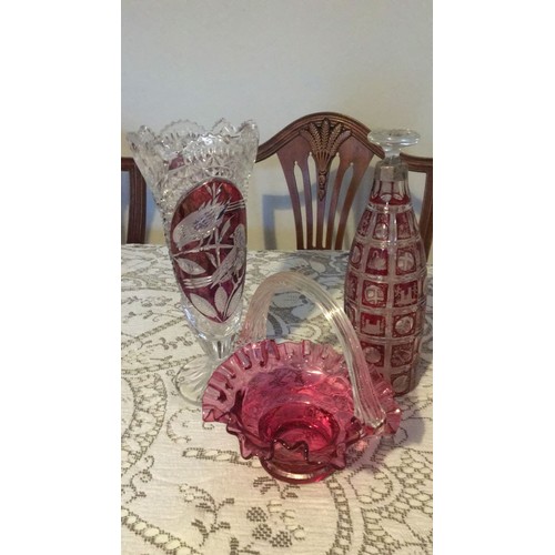 11 - Three pieces of cranberry, glass. Including brides basket, byrdes vase, And flash glass decanter wit... 