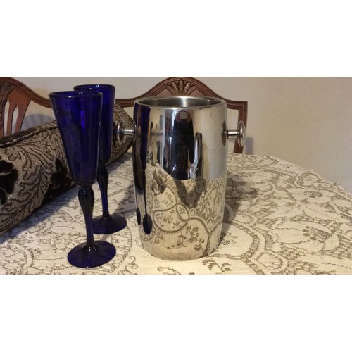 23 - Bristol, blue glass, signed, champagne, flutes And a vintage wine bottle, cooler