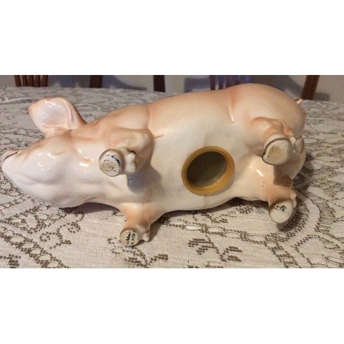 28 - Large, pottery, pig, money box, signed.