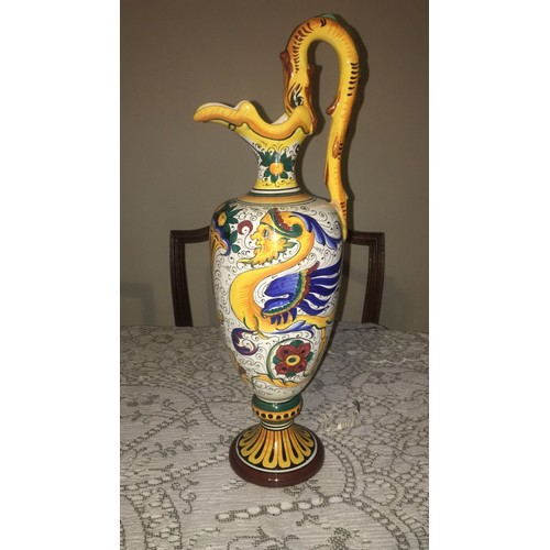 37 - Italian pottery ewer / vase. Mythical creature pattern with dragon or serpent handle,