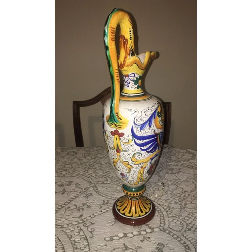 37 - Italian pottery ewer / vase. Mythical creature pattern with dragon or serpent handle,