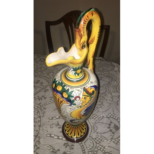 37 - Italian pottery ewer / vase. Mythical creature pattern with dragon or serpent handle,