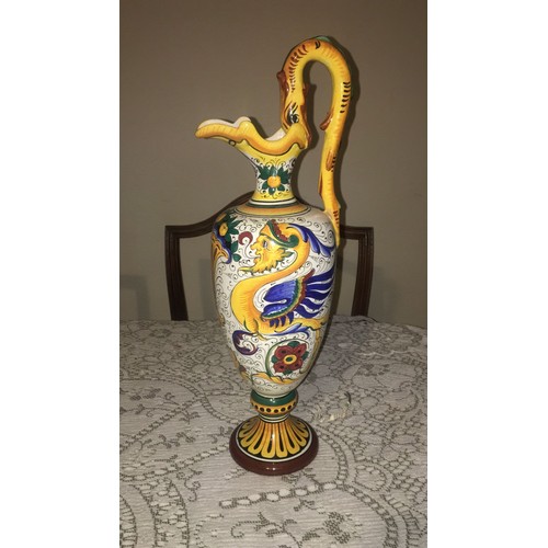 37 - Italian pottery ewer / vase. Mythical creature pattern with dragon or serpent handle,