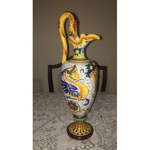 37 - Italian pottery ewer / vase. Mythical creature pattern with dragon or serpent handle,