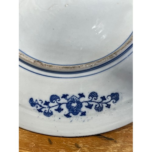 61 - Oriental blue and white platter with bird decoration and blue circular rings under base