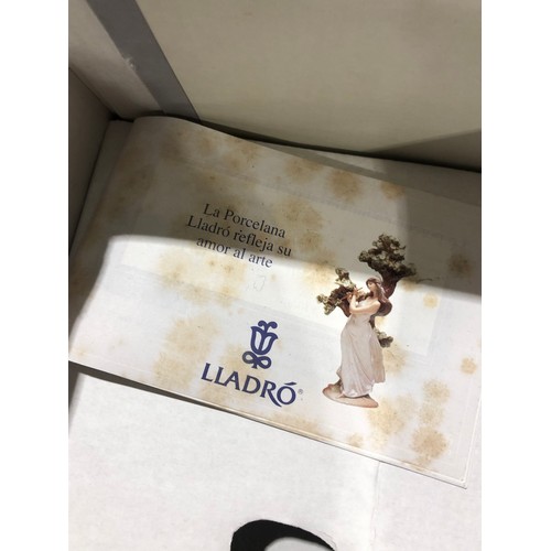 74 - Lladro  lady figurine. Boxed