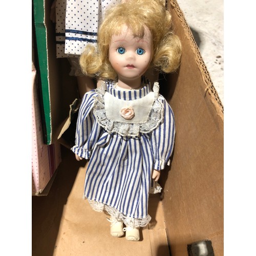 253 - Boxed collectors porcelain dolls