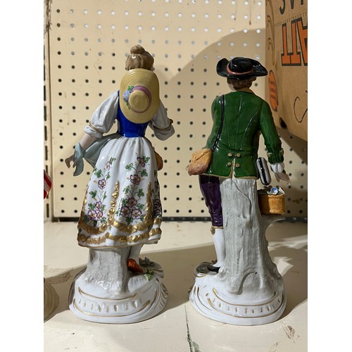 256 - Pair of Sitzendorf boy an girl figurines.