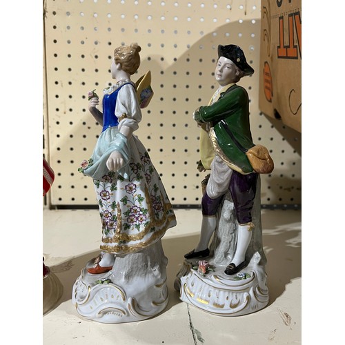 256 - Pair of Sitzendorf boy an girl figurines.