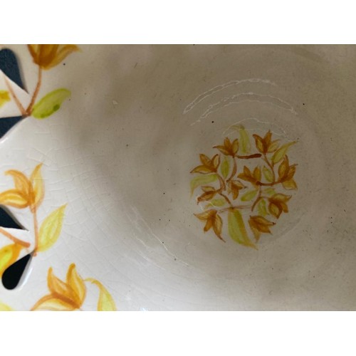 237 - Hand painted glazed ceramic decorative bowl with heart cut out feature,  trademark says HILTON.