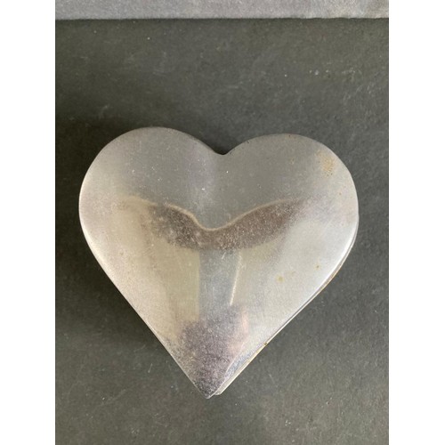 201 - Heart shaped Silver coloured trinket box with lid 11cm wide x 4cm deep.