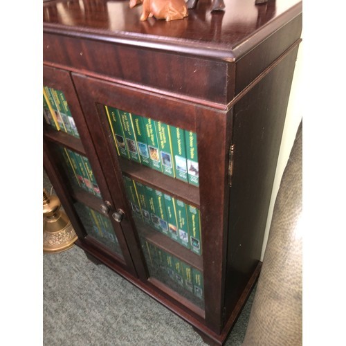 209 - Good quality Rosewood glazed bookcase. With double doors and 2 shelves. Including a set of National ... 